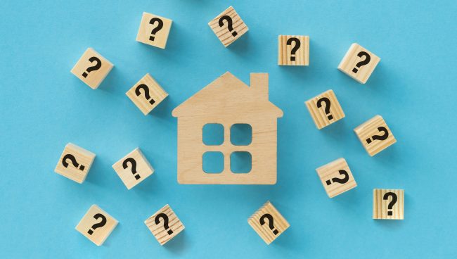 House Searching Concept with wooden blocks Symbolizing Real Estate and Property Hunt